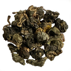 sticky rice  green to dark green oolong leaves rolled into pearls