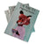 Three boxes of playing cards with illustration of a fox holding a teacup.
