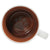 Cat pawprint on mug bottom