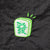 A close-up of a black bag featuring a green and white embroidered patch with Chinese characters and three small green lines above it.