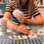 Someone playing with tea-themed cards.