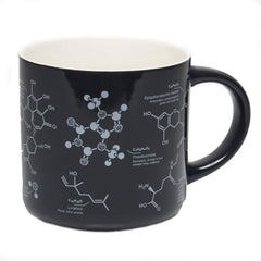 Black mug with molecular structures of tea components in white. Interior of mug is white.