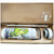 A white travel mug with tea-drinking dinosaur art, shown inside its brown cardboard packaging box with accessories and printed diagrams.
