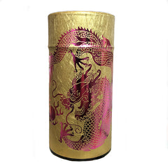 Cylindrical tin wrapped in gold washi paper with pink dragon.